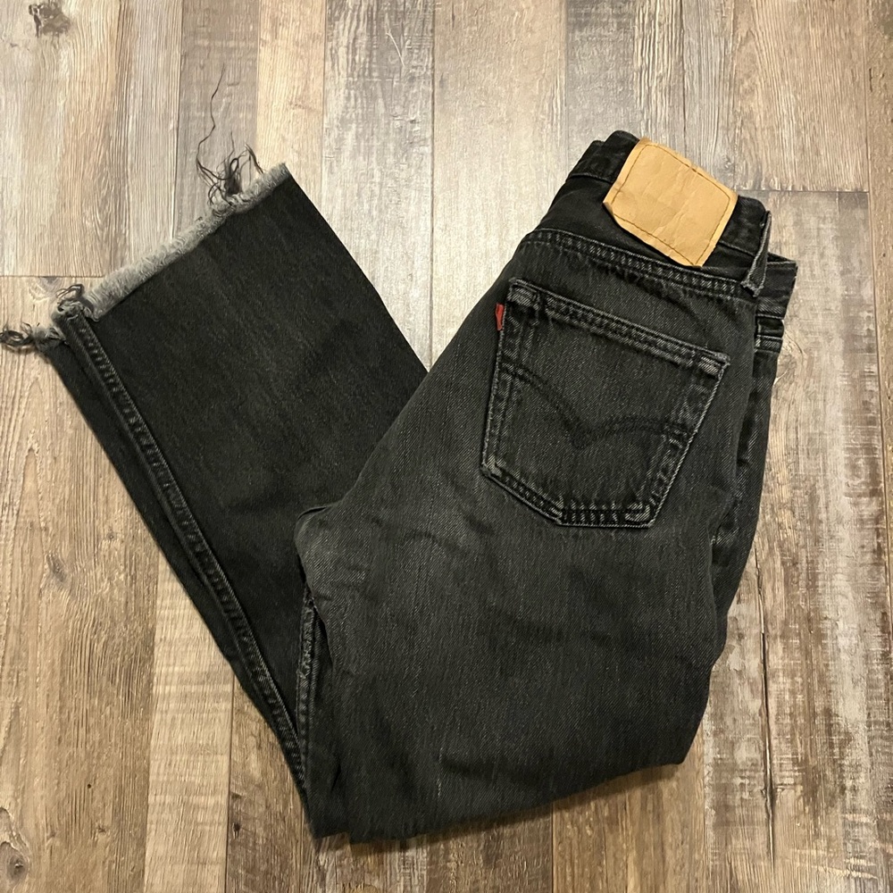 Levi’s 501 Made in the USA 100% cotton black button fly with raw hem